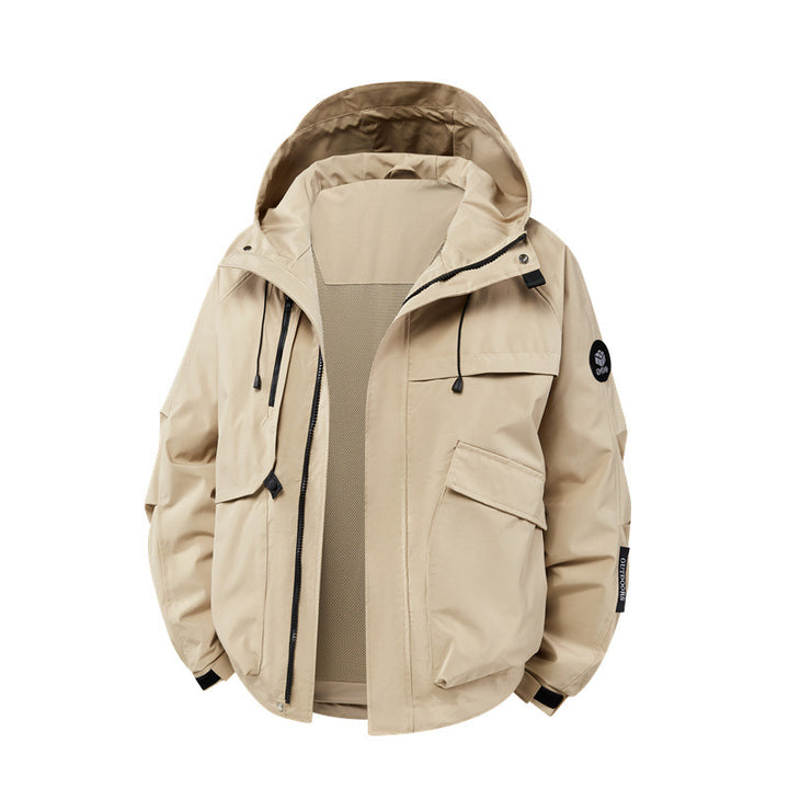 Technical outdoor jacket for men in waterproof material with numerous zippered pockets Lune London