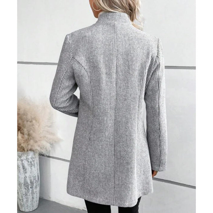 Ladies elegant long coat with structured design and refined details Lune London