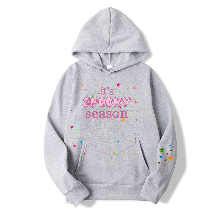Women cozy hoodie with graphic Halloween design Chic & Stil