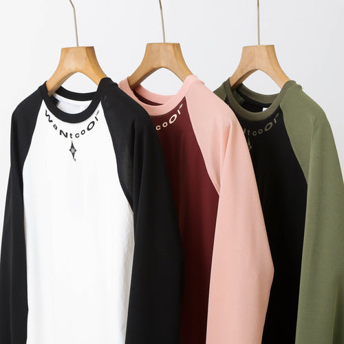 Chemise longue à manches longues sportive pour femmes avec construction innovante de manches raglan Chic & Stil