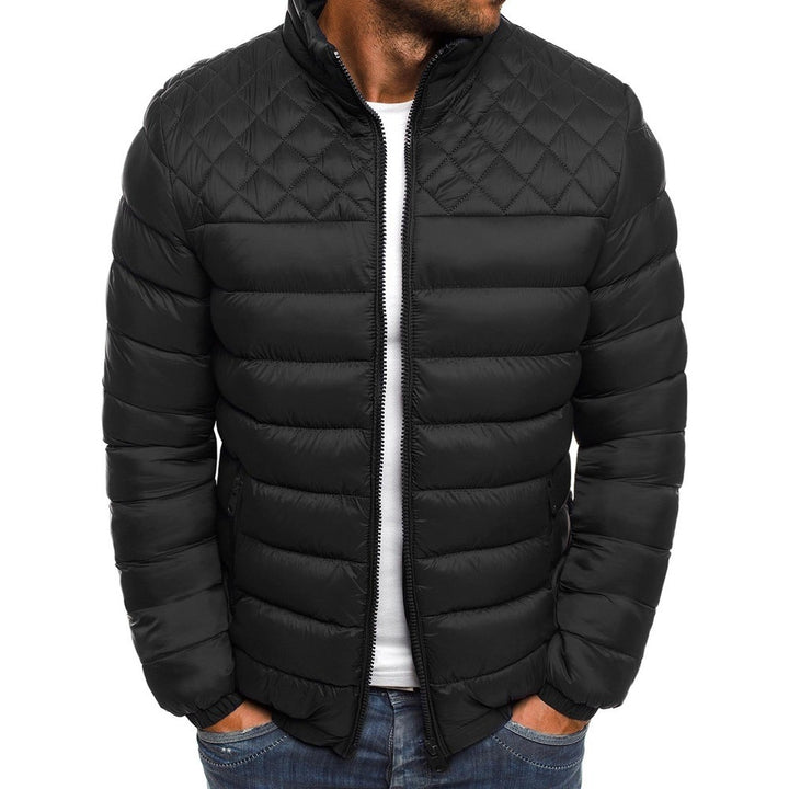 Padded transition jacket for men with high collar and practical zip pockets Lune London