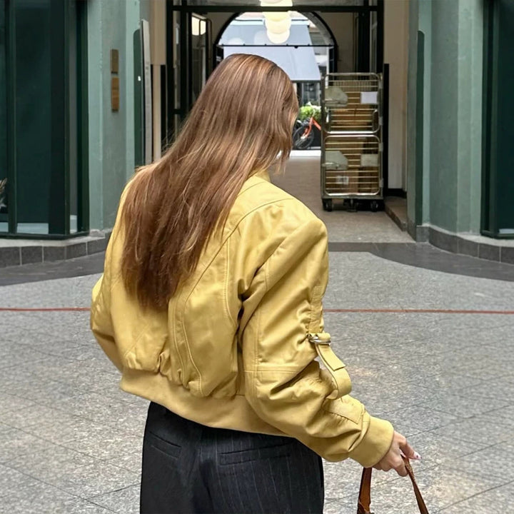 Women's short bomber jacket in boxy cut with distinctive seam details, zipper pockets and ribbed cuffs Amarae