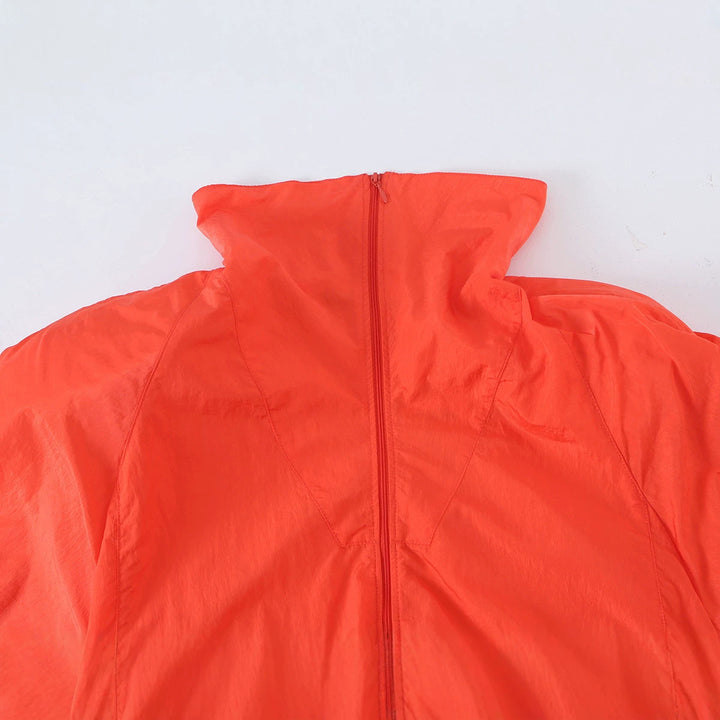 Ladies Light Wind Jacket with High Collar, Drawstring Waist and Elastic Cuffs Amarae