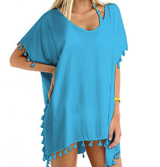 Tuniques de plage pour femmes avec une structure aérienne et des pompons ludiques Chic & Stil