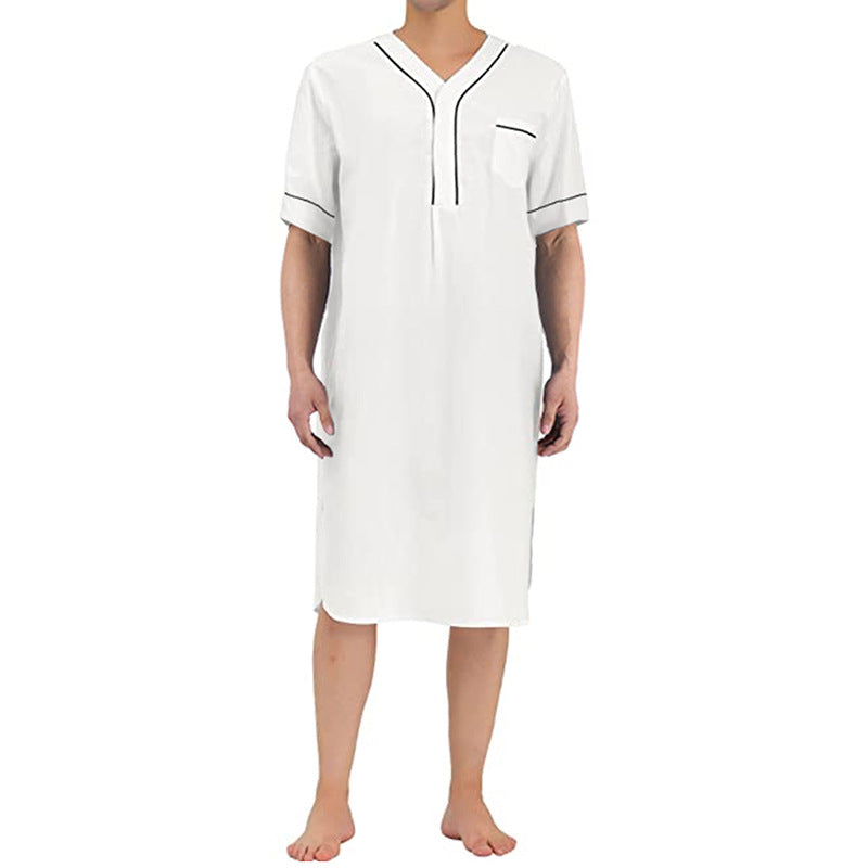 Short dress with short sleeves for women featuring a modern high collar and a practical button placket Lune London