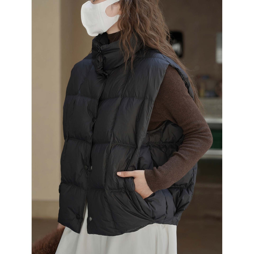 Women's lightweight quilted vest with high collar and snap button placket Amarae