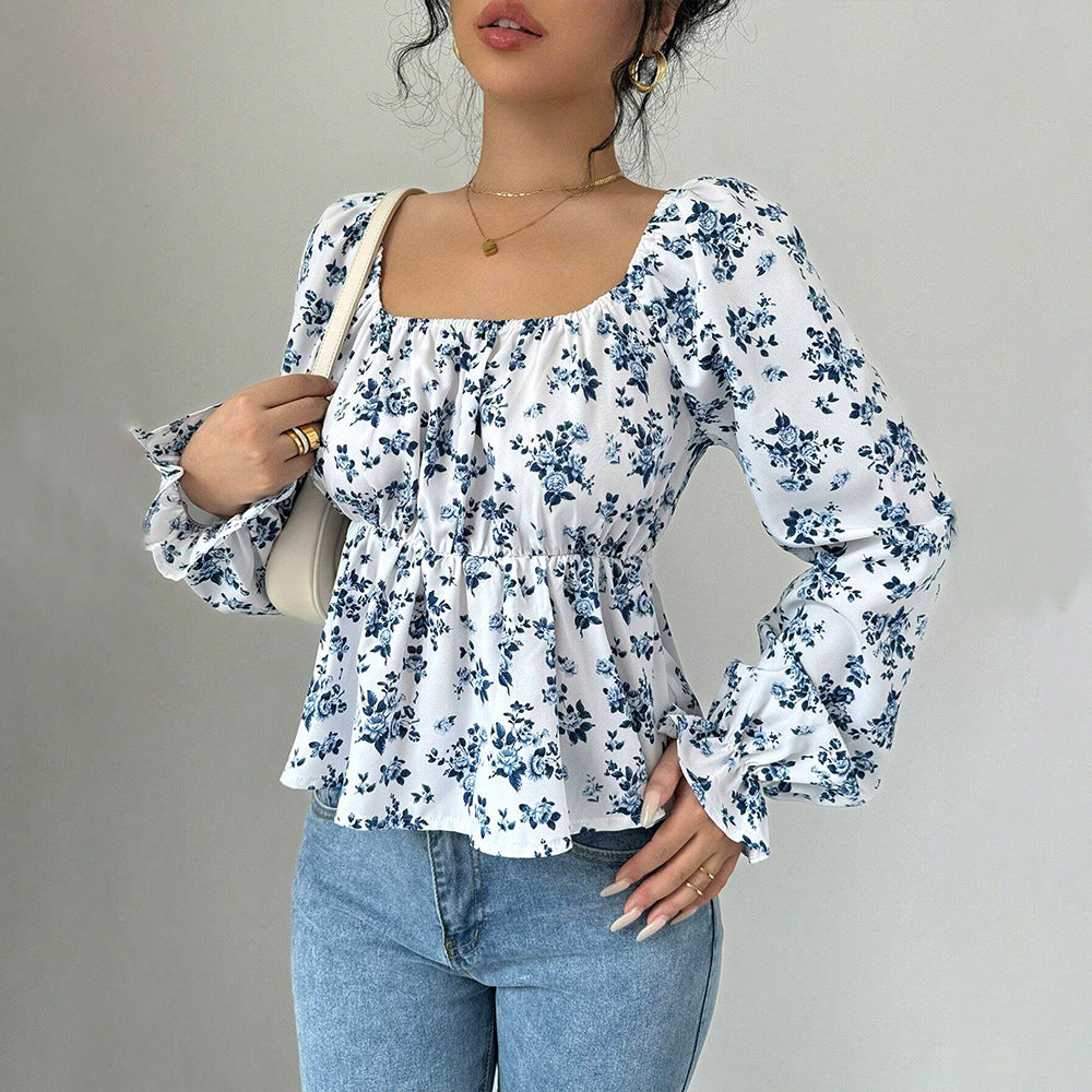 Blouse femme avec design floral et manches volumineuses Chic & Stil
