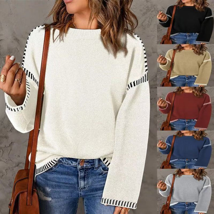 Fashionable women's sweater with structured material and stripe-shaped details Lune London