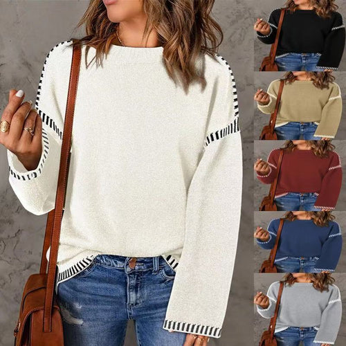 Fashionable women's sweater with structured material and stripe-shaped details Amarae