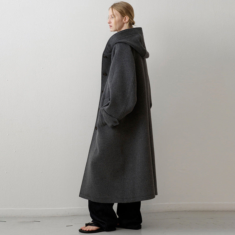 Manteau en laine surdimensionné pour femmes avec capuche et poches pratiques Chic & Stil