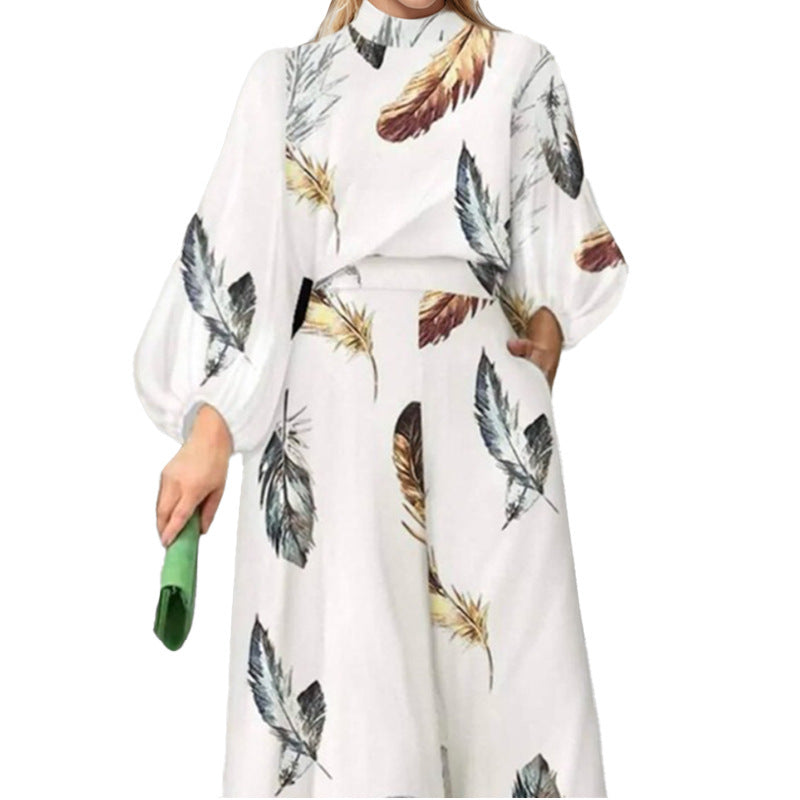 Ensemble élégant pour femme en deux pièces avec des manches en forme de ballon et un design en plumes Chic & Stil