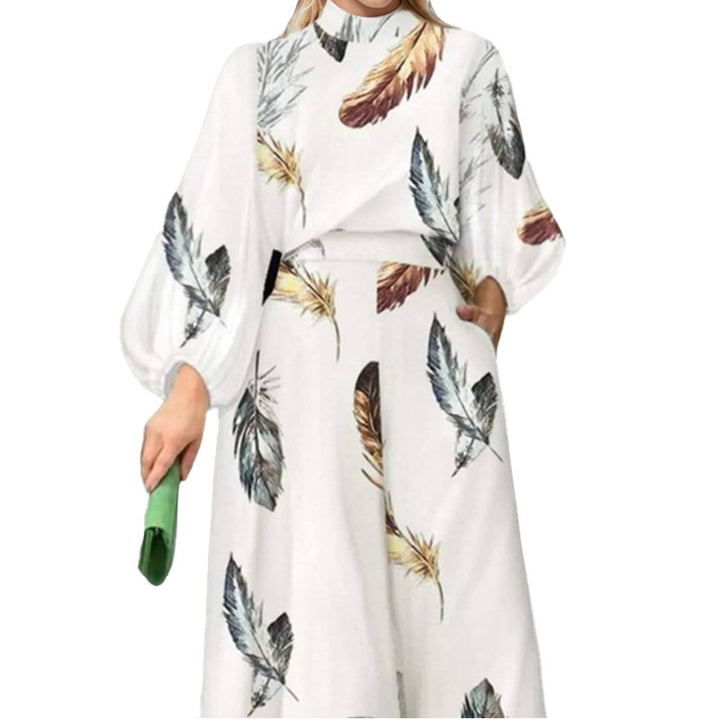 Ensemble élégant pour femme en deux pièces avec des manches en forme de ballon et un design en plumes Chic & Stil