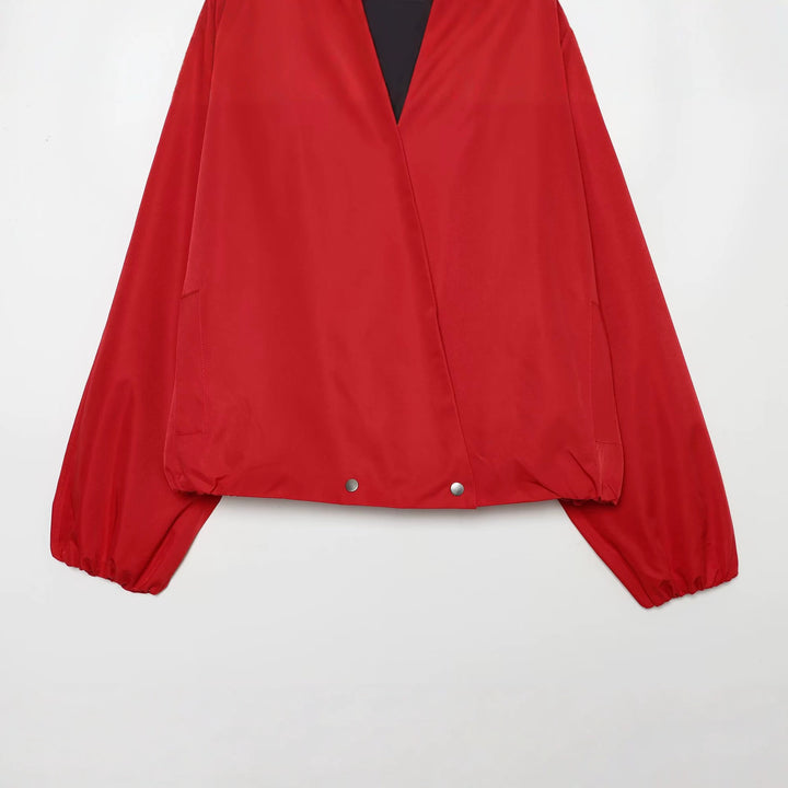Women's bomber-style short jacket with kimono collar, balloon sleeves, and elastic hem Amarae