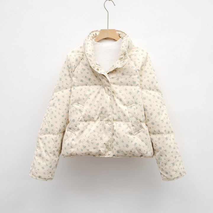 Veste matelassée volumineuse pour femmes avec un design floral et des poches pratiques Lune London
