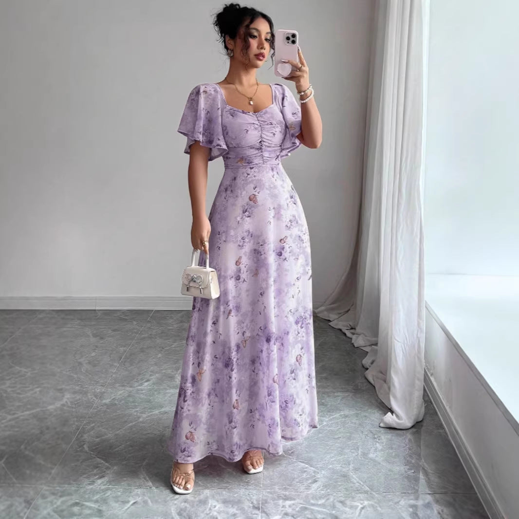 Women's maxi dress with flowing cut and romantic floral pattern Lune London