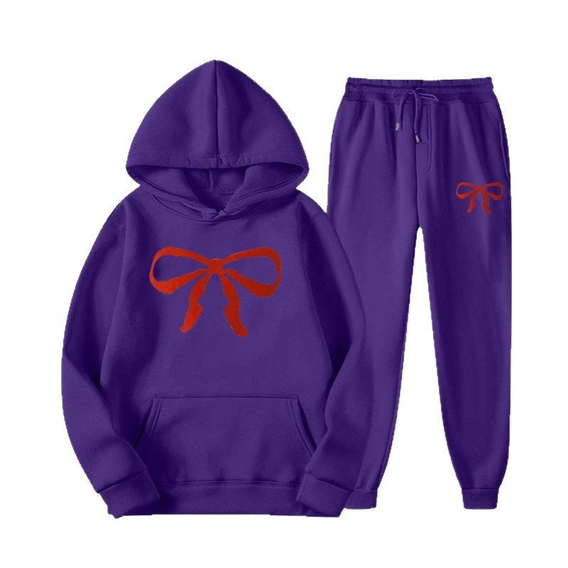 Women's hooded sweat suit with creative bow motif and comfortable fit Chic & Stil