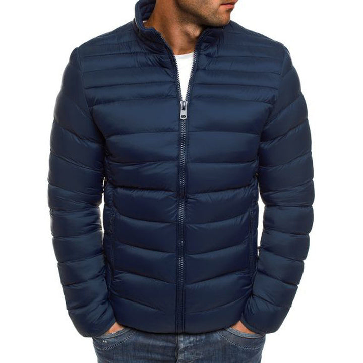 Quilted jacket for men with a stand-up collar and zippered side pockets Lune London