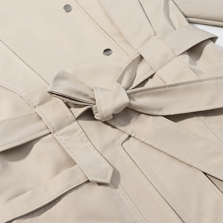 Ladies short trench coat with cape detail, stand-up collar and tie belt Amarae