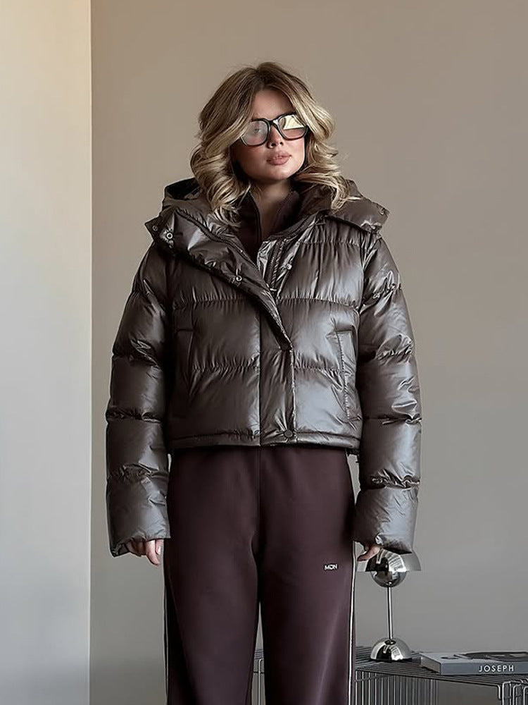 Women's short-cut shiny quilted jacket with high stand-up collar and snap-button placket Amarae