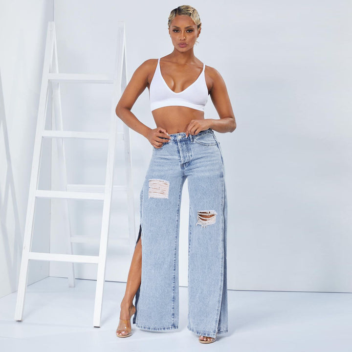 Ladies wide high-waist jeans with side leg slits, destroyed knee, and shaping waistband Amarae