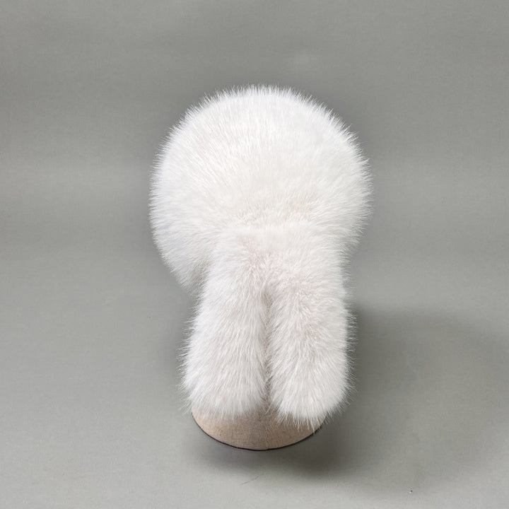 Women’s plush faux fur trapper hat with earflaps and decorative tail Amarae