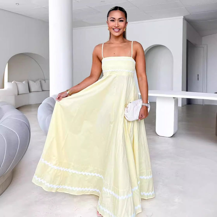 Women's airy long dress with delicate ruffle details and adjustable spaghetti straps Lune London