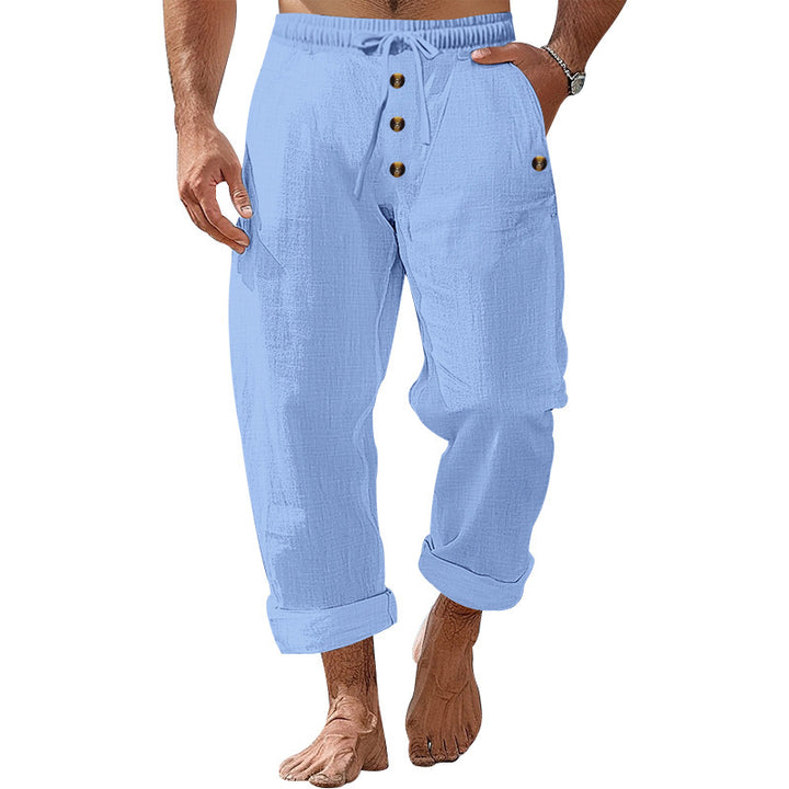 Casual beach pants for men with elastic waistband and practical button details Lune London