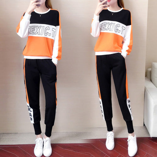 Women’s sporty leisure set with fashionable accents and elastic cuffs Chic & Stil