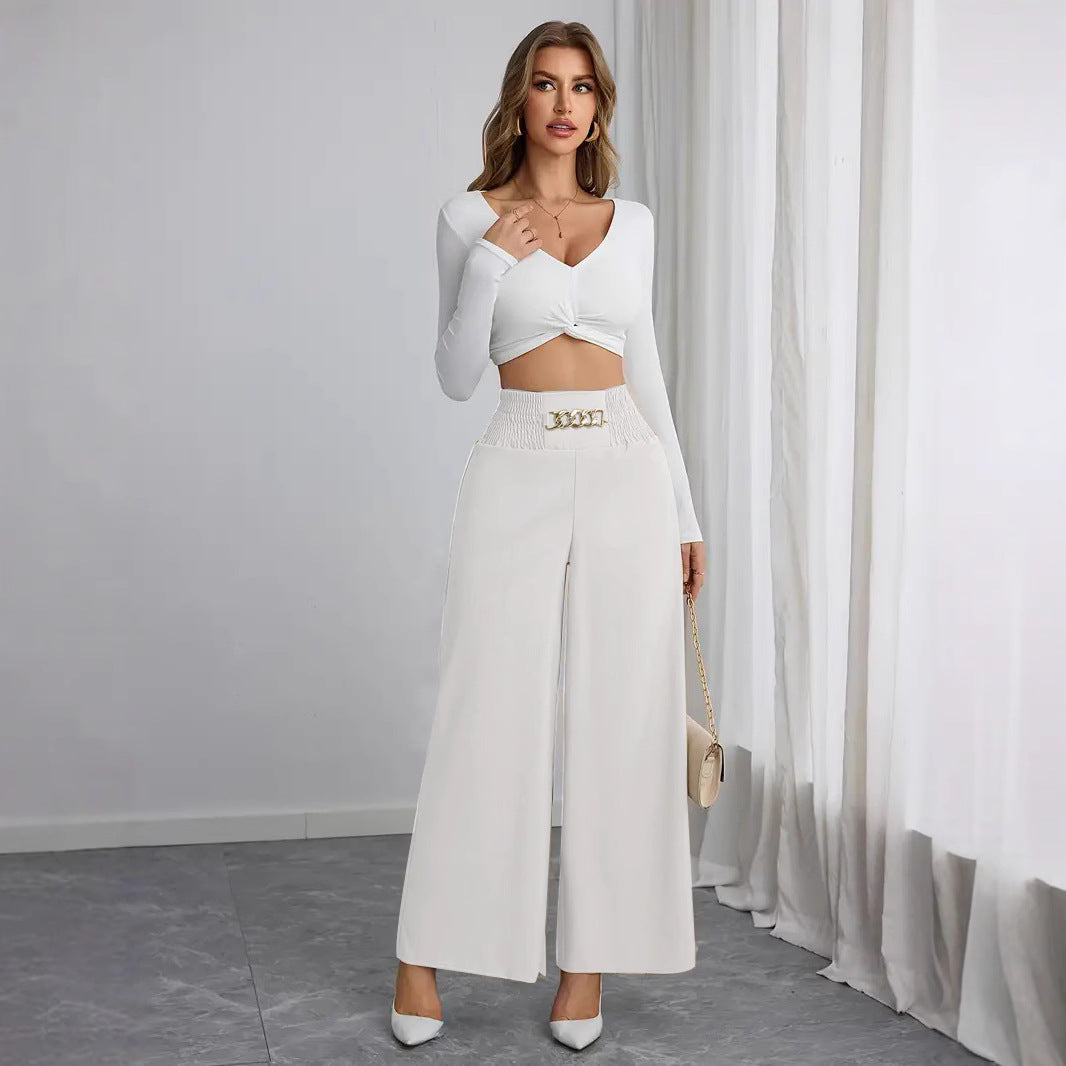 Wide palazzo trousers for women with elastic waistband and decorative belt Lune London