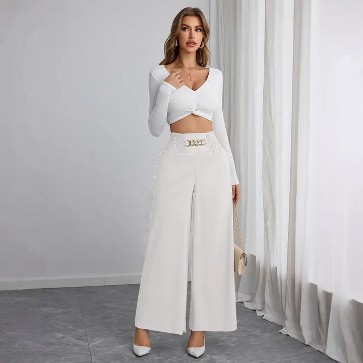 Wide palazzo trousers for women with elastic waistband and decorative belt Lune London