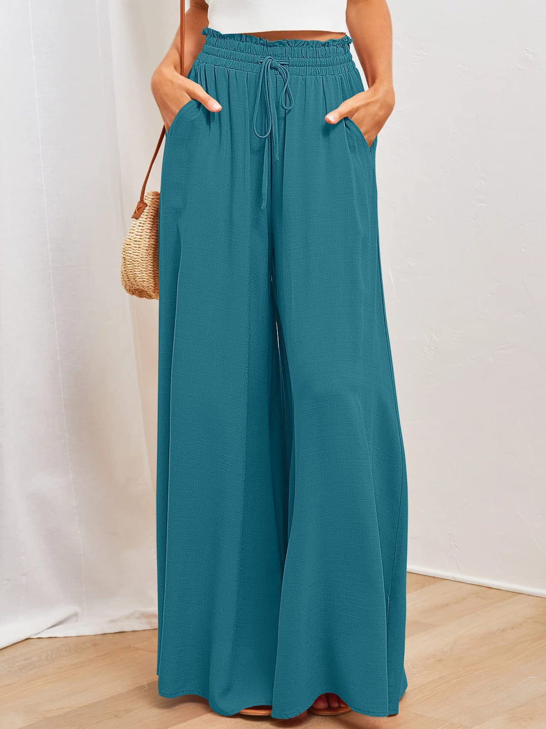 Wide Palazzo pants for women with elastic waist and practical side pockets Lune London