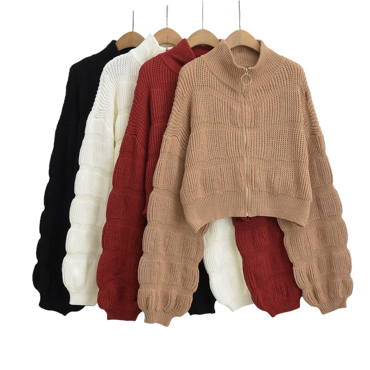 Cropped knitted jacket for ladies with decorative zipper and voluminous sleeves Lune London
