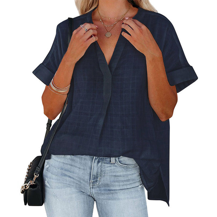 Casual short-sleeve blouse for women with a deep V-neckline and rolled sleeves Lune London
