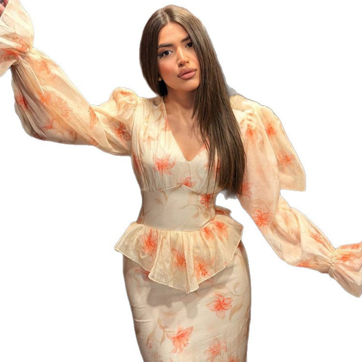 Women’s midaxi dress with peplum, V-neck and voluminous puff sleeves Amarae