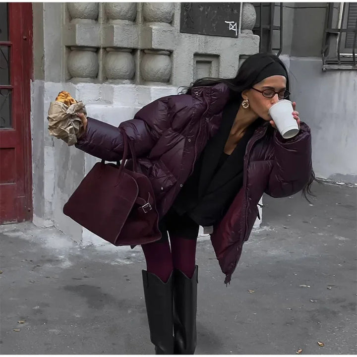 Oversized fashionable down jacket for women with a belted waist and side pockets Lune London