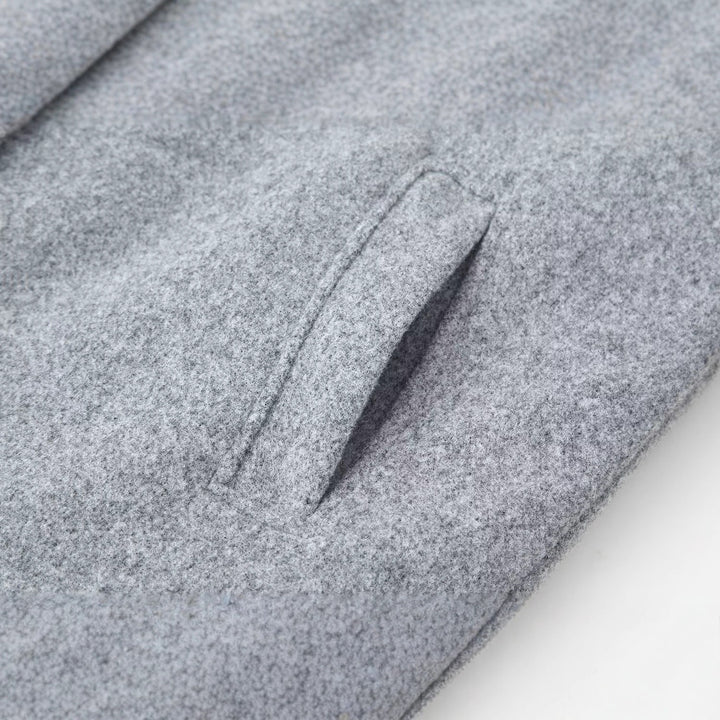 Veste en laine à la mode pour femmes avec col haut et patte à double bouton Chic & Stil