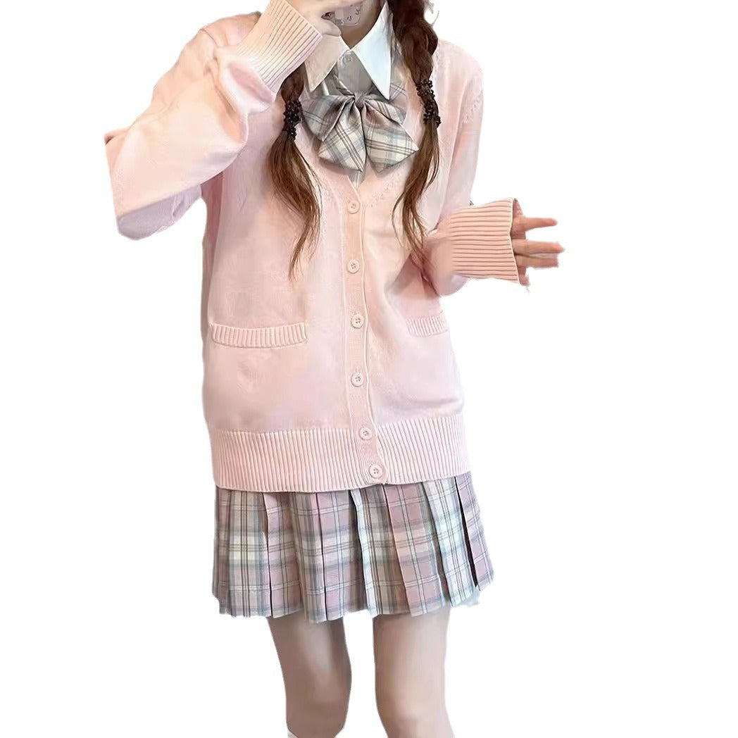 Cardigan féminin ludique avec grand col et détail de nœud Chic & Stil