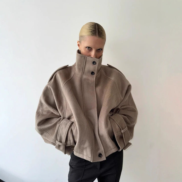 Women's short jacket made of wool blend with high stand-up collar, balloon sleeves and shoulder flaps Amarae
