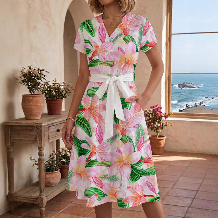 Women’s midi dress with colorful floral design and adjustable tie belt Lune London