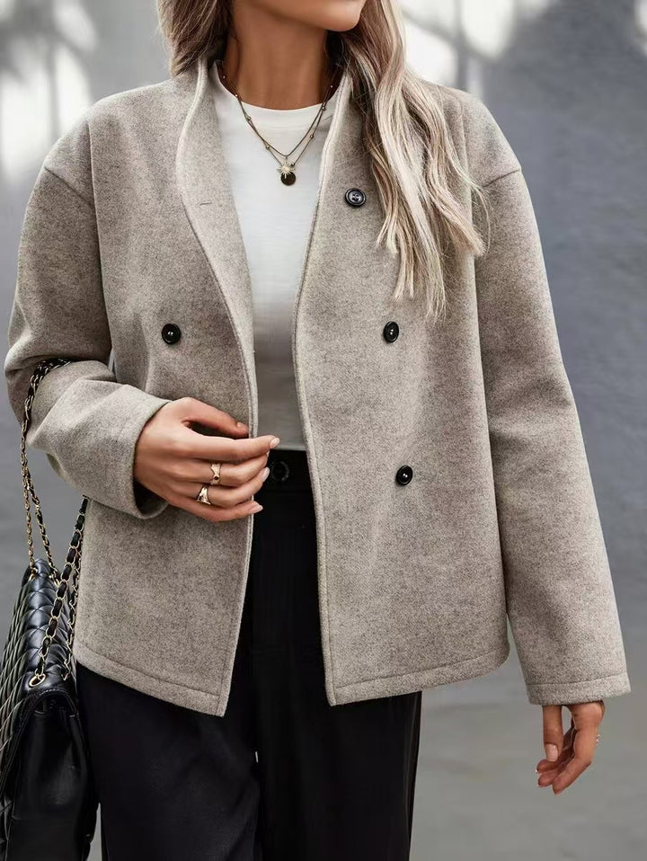 Elegant wool jacket for women with a chic look featuring a double-breasted button row Lune London