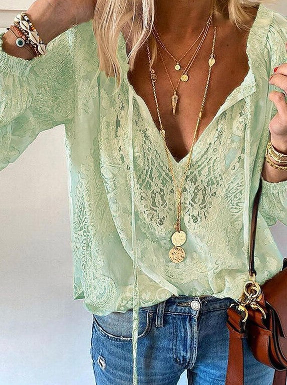 Women's elegant blouse with fine lace and deep V-neck Lune London