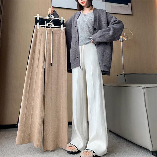 Pantalon de loisirs femme à coupe large avec taille élastique et poches pratiques Chic & Stil