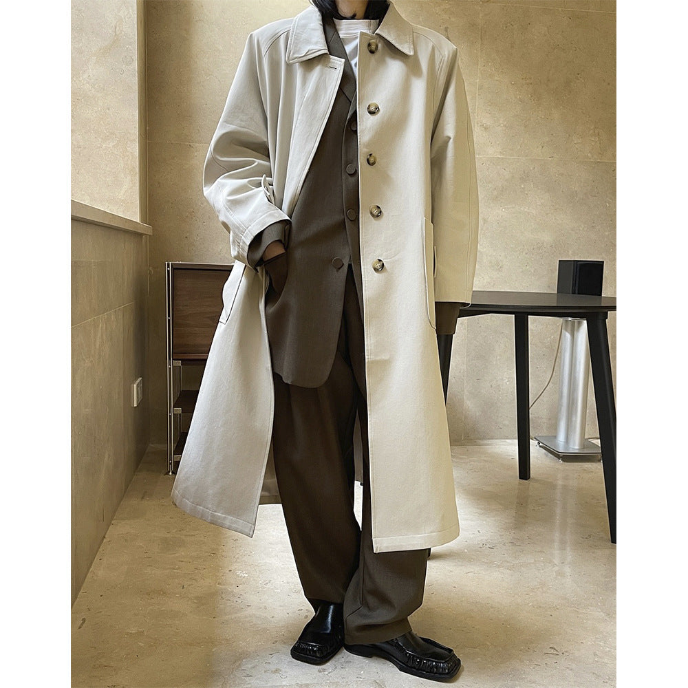 Women's longline coat in minimalist trench style with side pockets Amarae