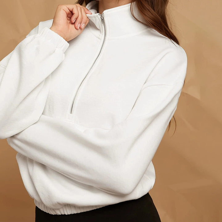 Haut de survêtement zippé décontracté pour femmes avec poche kangourou et ourlet élastique Chic & Stil
