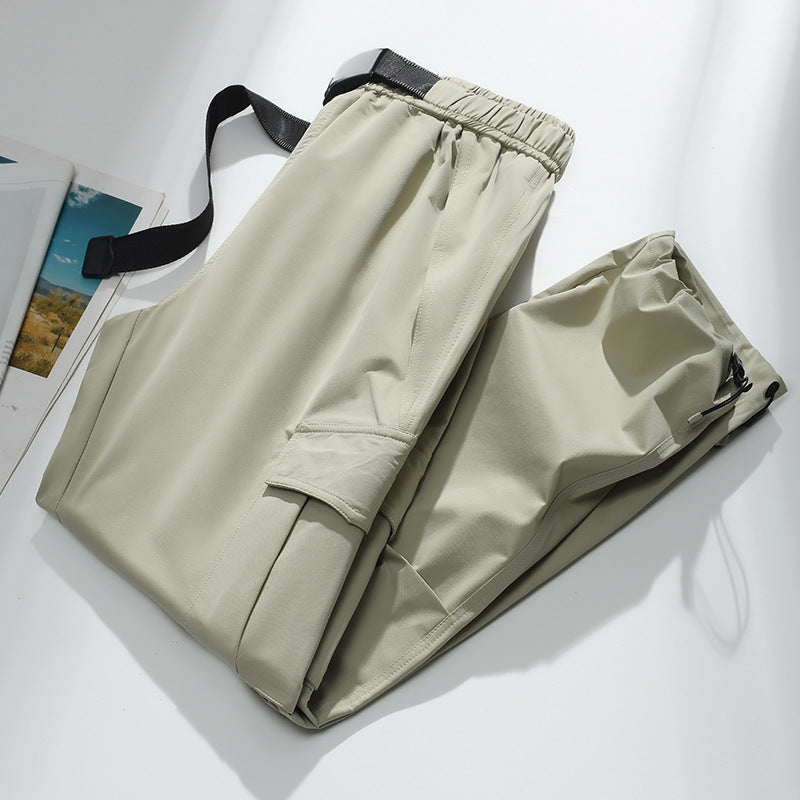Men's cargo joggers with elastic waistband, drawstring, adjustable leg cuffs, and patch pockets.