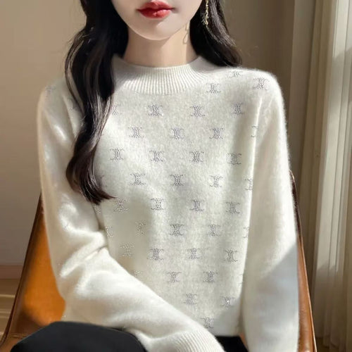 Sweater en tricot de luxe pour femmes avec un design en fine paillettes et encolure ronde Chic & Stil