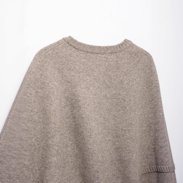 Ladies knit-cape with elegant row of buttons Lune London