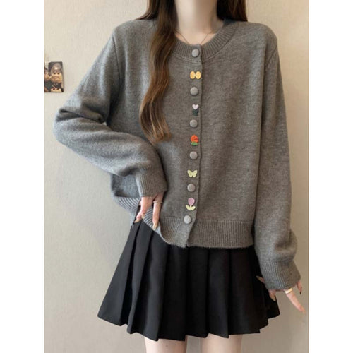 Cardigan confortable pour dames avec des boutons colorés Chic & Stil