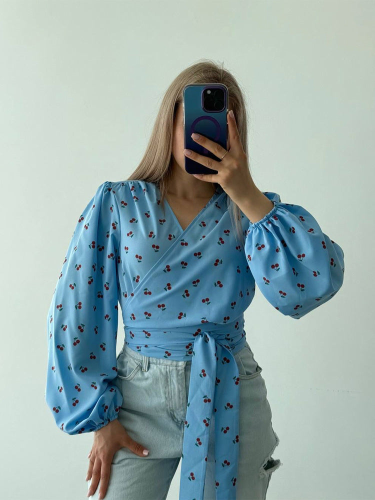 Women's wrap blouse with cherry print, wide puff sleeves & tie belt Amarae