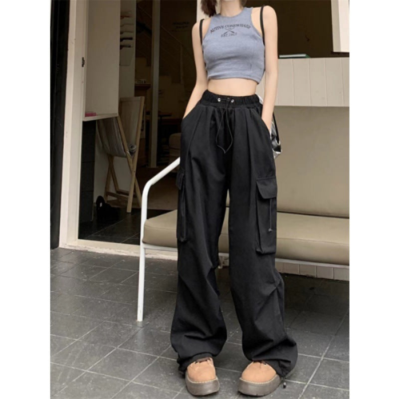 Women's cargo trousers with side pockets and elastic waistband Chic & Stil